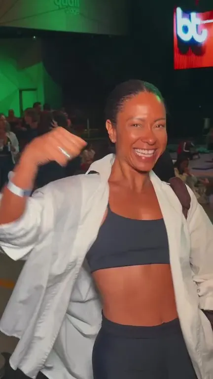 Aluna comemorando o Wolffit no Qualistage com a Bodytech